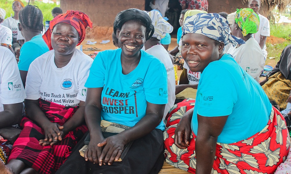 Group of women sitting outside.